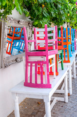 Colorful chairs on tables