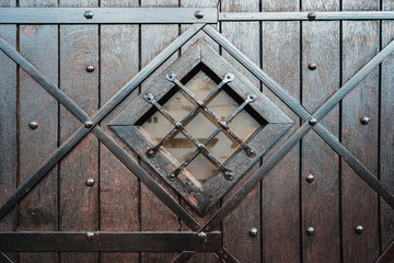 large antique wooden upholstered doors