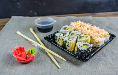 delivery of rolls at home. Sticks, soy sauce.