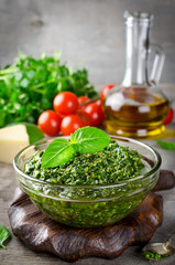 Homemade basil pesto with pine nuts, parmesan and garlic.