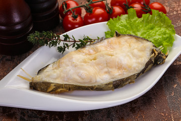 Baked wolffish steak