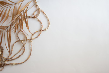 Flat lay vacation accessories on white background. Top view travel or vacation concept. Blank space for text