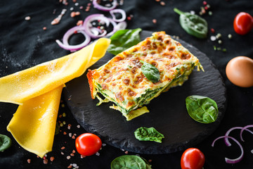 italian lasagna slice with fresh ingredients