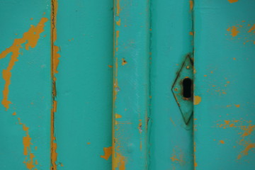 keyhole in a poorly maintained beach hut