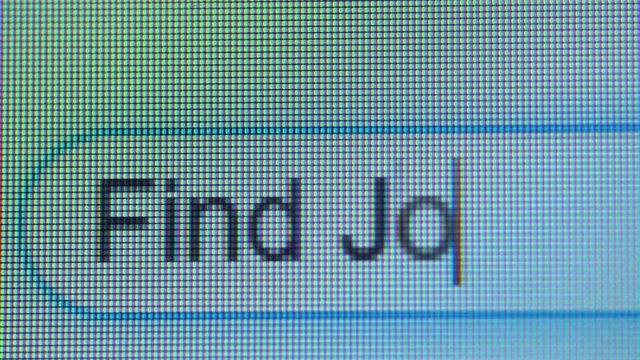 Search bar with Find Job text on the computer monitor. Shot in 4k resolution