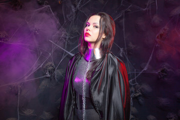 Fototapeta premium futuristic Space fashion person in silver stylish outfit in the smoke