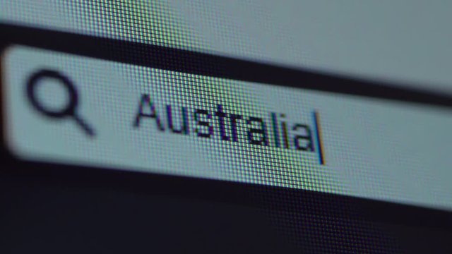 Browser bar with typed Australia keyword on the computer screen. Search Engine Concept. Shot in 4k resolution
