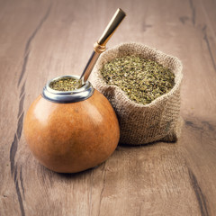 Yerba mate on wooden table