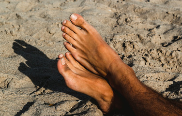 feet in the sand