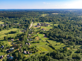 Fototapeta premium Landscape with a road in the forest