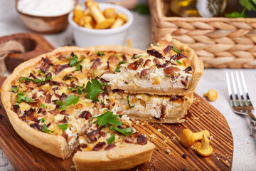 Quiche – open tart pie with chicken meat, chanterelles mushrooms, onion and cheese