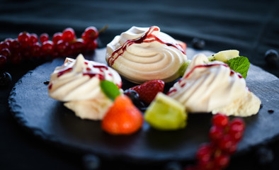 delicious pavlova sweet with fresh fruits