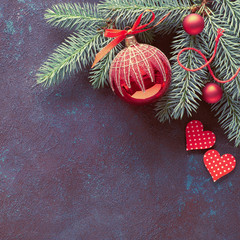 Christmas decorations: fir twigs, berries and Christmas baubles