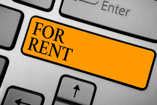 Text sign showing For Rent. Conceptual photo when you make property available for purchasing temporarily Keyboard orange key Intention create computer computing reflection document
