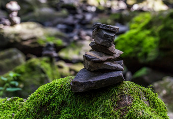 A stone tower on a rock