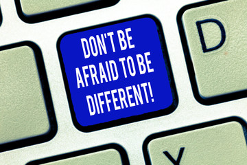Word writing text Don T Be Afraid To Be Different. Business concept for Positive attitude...