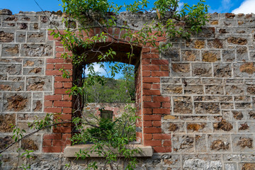 An old ruined hstoric store house onthe island of Curacao