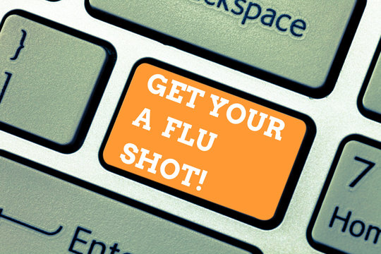 Writing note showing Get Your A Flu Shot. Business photo showcasing Have a vaccination for avoiding being sick immunization Keyboard key Intention to create computer message pressing keypad idea