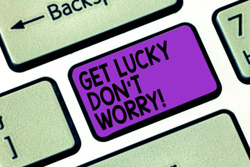 Text sign showing Get Lucky Don T Worry. Conceptual photo Stop worrying and have a good fortune luck success Keyboard key Intention to create computer message pressing keypad idea