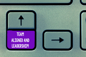Text sign showing Team Aligned And Leadership. Conceptual photo Good tram work partnership job alliances Keyboard key Intention to create computer message, pressing keypad idea