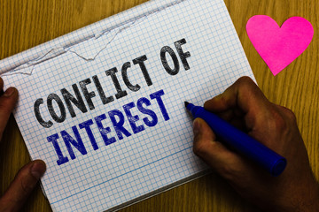 Handwriting text Conflict Of Interest. Concept meaning disagreeing with someone about goals or targets Paper register multiline text pen handwriting love heart table background