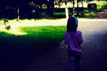 Fototapeta na wymiar Lost in the park preschool child in search of parents