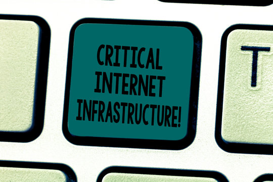 Text sign showing Critical Internet Infrastructure. Conceptual photo essential components of internet operation Keyboard key Intention to create computer message pressing keypad idea