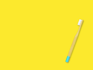 Bamboo toothbrush on the colorful background