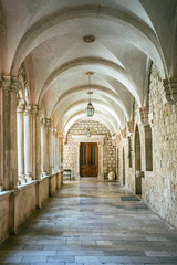 Courtyard with columns and arches in old Dominican monastery in Dubrovnik, Croatia