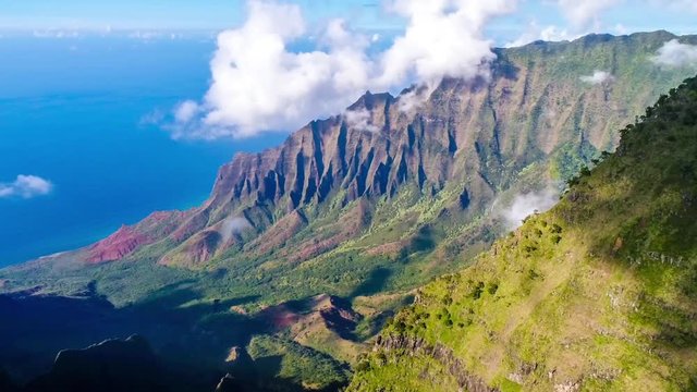 Aerial Shot of the cliff mountain and the sea in Na Pali coast in Kauai Hawaii