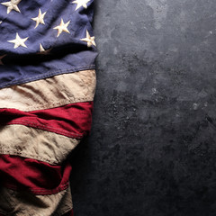 US American flag on worn black background. For USA Memorial day, Veteran's day, Labor day, or 4th...