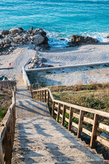 Stairs that bring to the beach.
