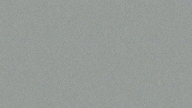 The white noise of the TV on a gray background with a large grain and fibers