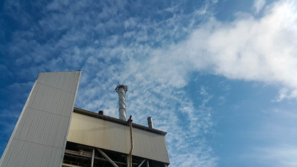 Beautiful blue sky with cloud over the factory