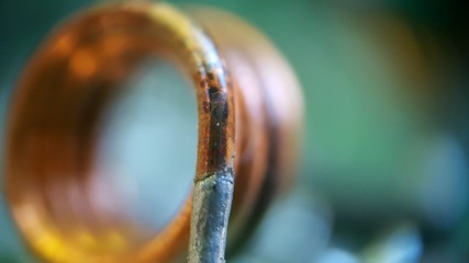 The copper wire windings on the radio transmitter circuit, the picture is taken in macro mode