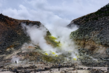 Iozan hissing mountains in Hokkaido, with sulphur and smoke