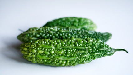 Bitter melon on white background. Healthy food.  