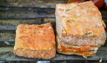 Red oncom. Oncom is one of the traditional staple foods of West Javan (Sundanese) cuisine of Indonesia. 