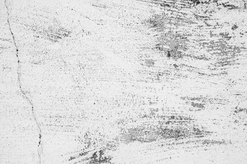 Obraz premium Texture of a concrete wall with cracks and scratches which can be used as a background