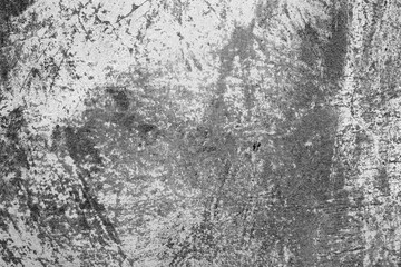 Texture of a concrete wall with cracks and scratches which can be used as a background