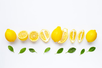 Fresh lemon with leaves isolated on white