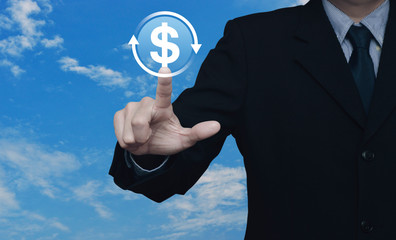 Businessman pressing money transfer flat icon over blue sky with white clouds, Business currency exchange service concept