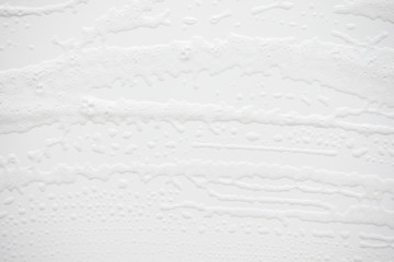 Abstract background white soapy foam texture. Shampoo foam with bubbles