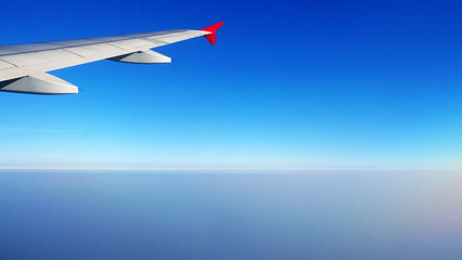 Looking at the sky in the morning on the plane.