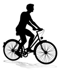 A bicycle riding bike cyclist in silhouette