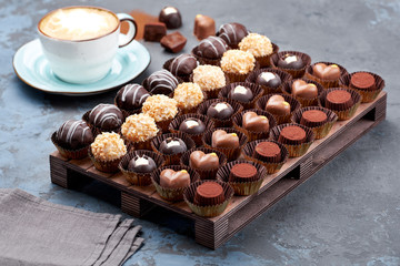 Chocolate handmade candies, pralines and truffles in assortment.