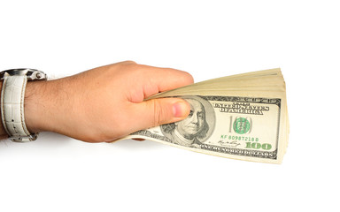 A bundle of money dollars in hands on a white background isolation