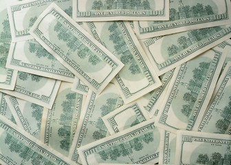 Texture US dollars. Background of one hundred dollar bills.