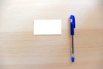 pen and note on the table