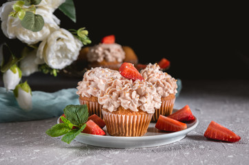 Homemade tasty cupcakes with fresh berries